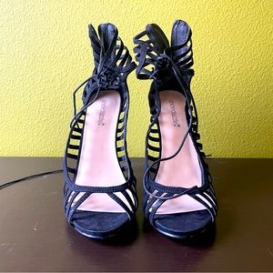 Strappy black stiletto heels